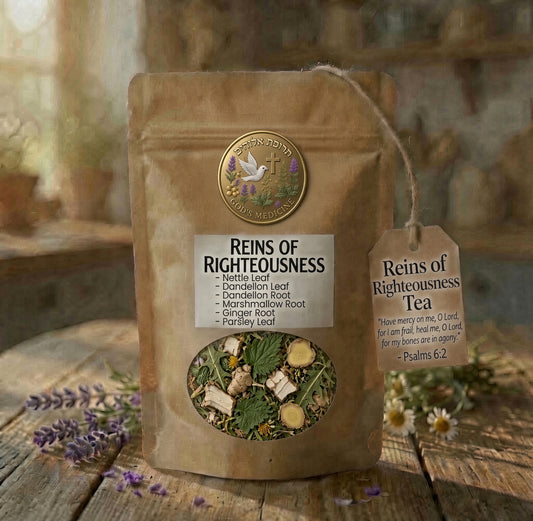 A kraft paper stand-up pouch of Reins of Righteousness Herbal Tea sits on a rustic wooden surface with scattered lavender and white flowers. The pouch has a circular window showing the loose herbal blend inside and a hanging tea tag with a Bible verse.