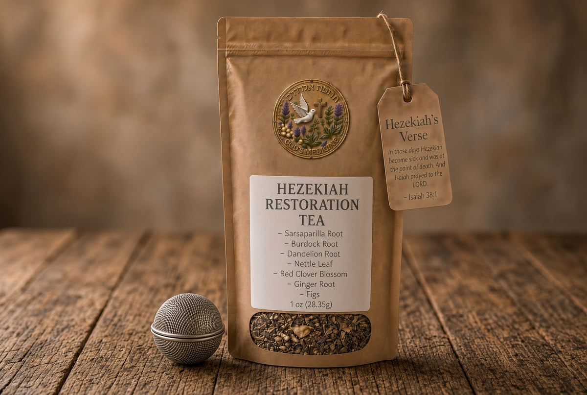 Hezekiah Restoration Tea pouch with loose herbal blend and metal ball tea infuser on a rustic wooden table