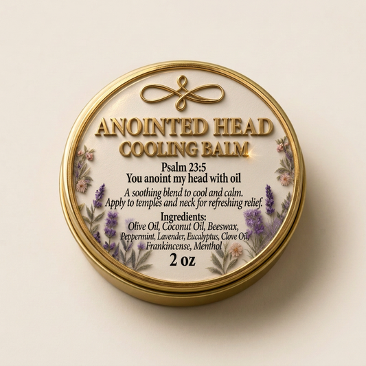 Closed gold tin of Anoint My Head With Oil Salve on a cream background.